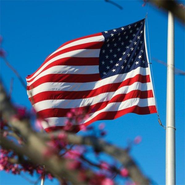 An American flag flies outside the Lubbers Student Service Center.