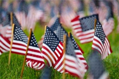 American flags fly on the lawn of the Kirkhof Center in honor of 9/11 victims.